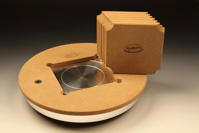 StudioPro Space Saver 14 inch MDF adapter bat on a wheel head with a stack of square insert bats