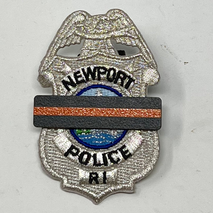 The Stop Gun Violence Wear Orange Awareness / Thin Orange Line Mourning Bars for Cloth Badges and insignia.  Black vinyl with a thin orange line mourning bar with a pair of 1/2" pins with military clasps.  Public safety officers are wearing thin orange line badge shrouds to raise awareness of gun violence in the community and among police officers, firefighters, Emergency Medical Services and others.  J