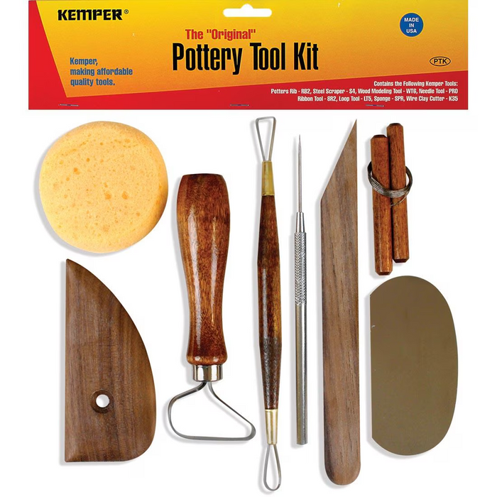 Kemper Original Pottery Tool Kit laid out: sponge, wood rib, loop, ribbon and needle tools, wood modeling tool, wire cutter, steel scraper