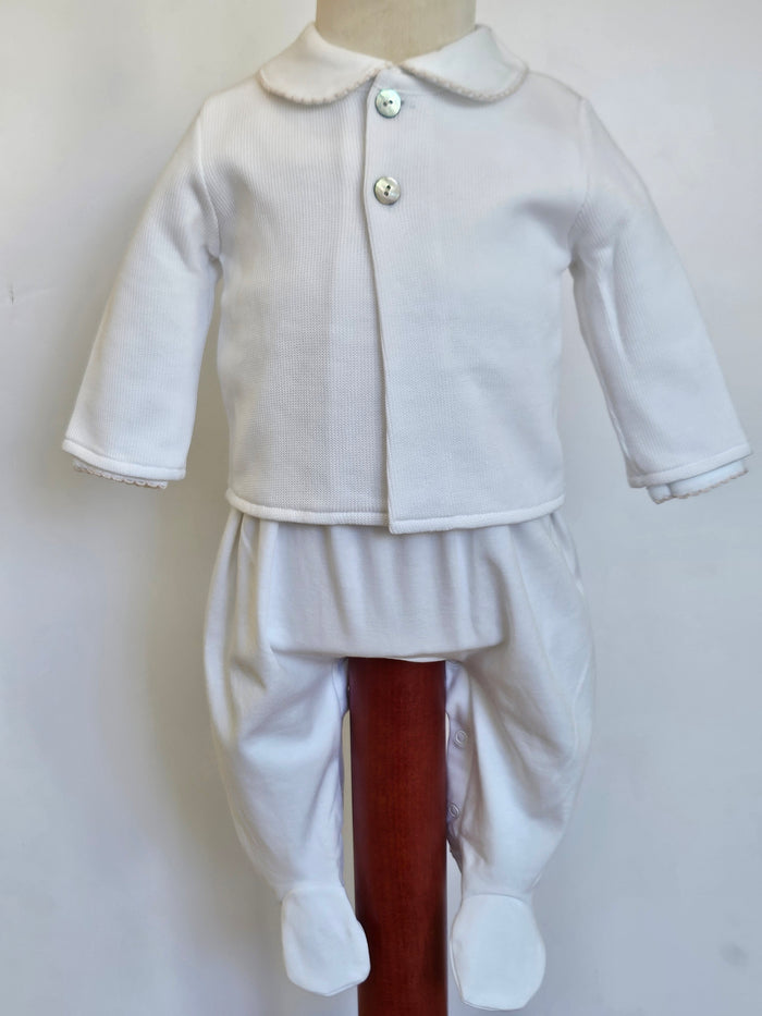 A white baby outfit set consisting of a long-sleeve button-front cardigan with a Peter Pan collar and matching footed pants, displayed on a mannequin torso.