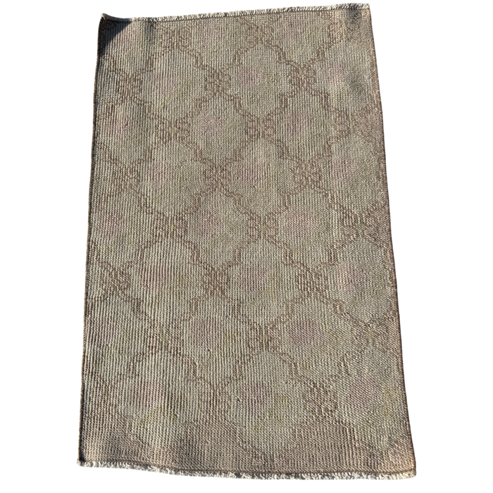 Textured fabric with a subtle pattern on a white background