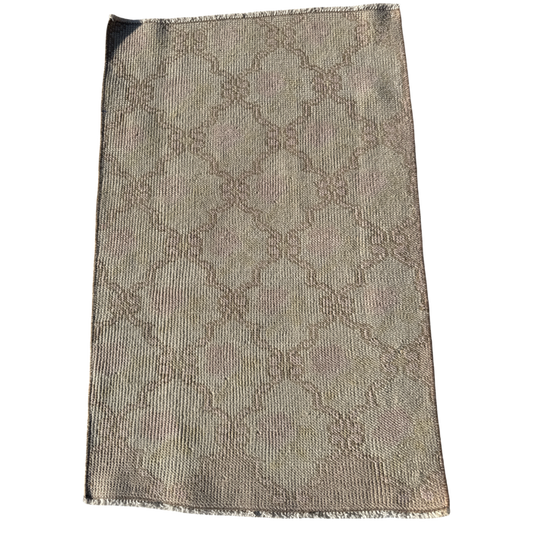 Textured fabric with a subtle pattern on a white background