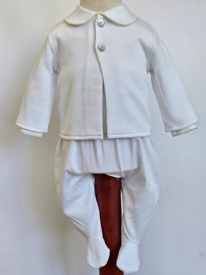 A white baby outfit set consisting of a long-sleeve button-front cardigan with a Peter Pan collar and matching footed pants, displayed on a mannequin torso against a plain light background.