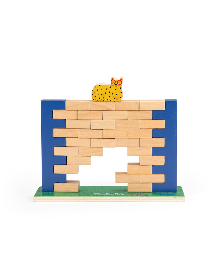 Wooden toy with a blue base and beige blocks, featuring a small animal on top.