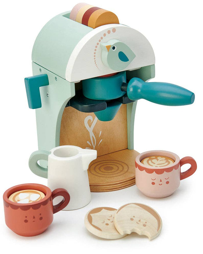 Toy espresso machine with cups and accessories on a white background