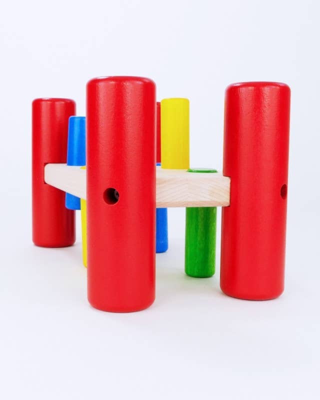 Colorful wooden toy with cylindrical blocks on a white background